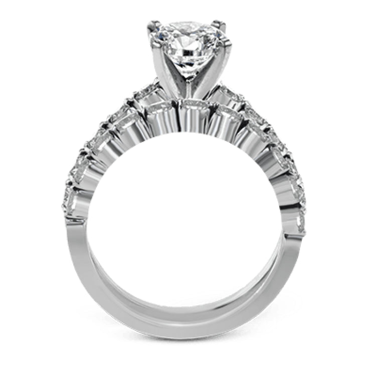 This marvelous white gold wedding set highlights its center stone with 1.19 ctw of round white diamond accents.