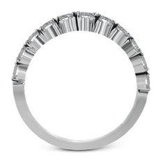 This marvelous white gold wedding set highlights its center stone with 1.19 ctw of round white diamond accents.
