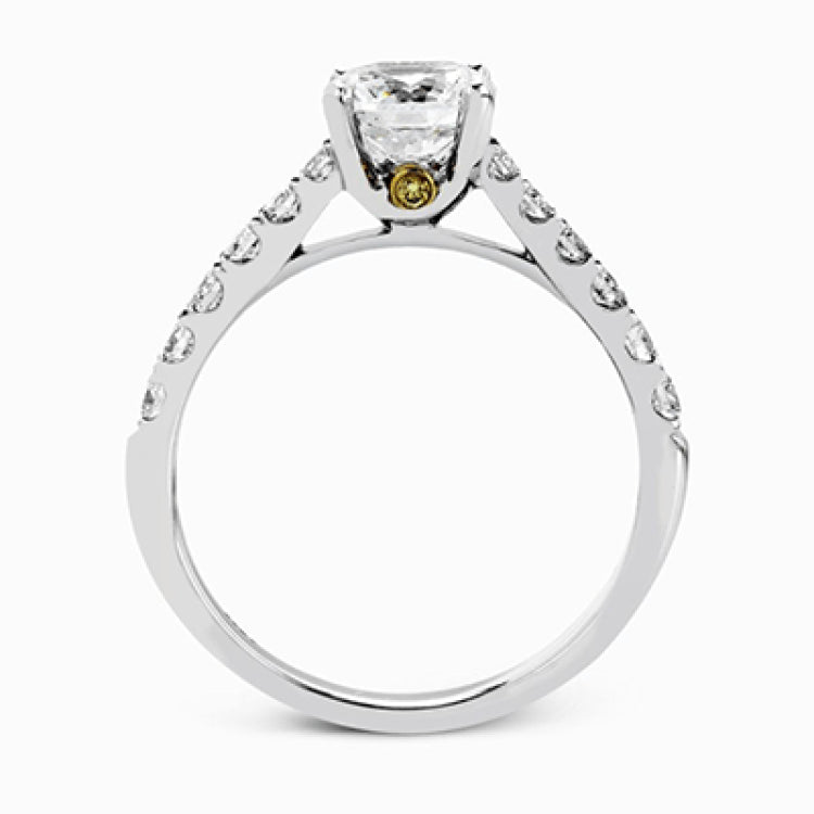 This charming contemporary two-tone wedding set is accented by .66 ctw of glistening round cut white diamonds with .02 ctw round cut yellow diamond accents.