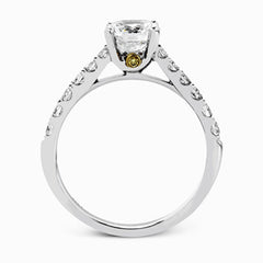 This charming contemporary two-tone wedding set is accented by .66 ctw of glistening round cut white diamonds with .02 ctw round cut yellow diamond accents.
