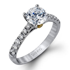 This charming contemporary two-tone wedding set is accented by .66 ctw of glistening round cut white diamonds with .02 ctw round cut yellow diamond accents.