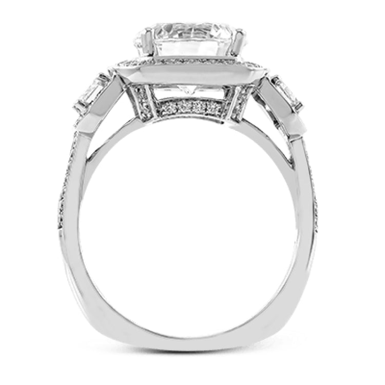 Featuring an impressive modern design, this white gold ring features .53 ctw emerald cut stone sides and .46 ctw round cut white diamonds.