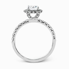 The classic halo design of this white gold engagement ring and wedding band are elevated by .80 ctw of shimmering round cut white diamonds.