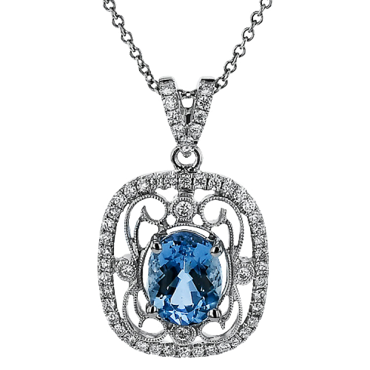 This lovely vintage inspired three-tone pendant features an intricate lacy design set with .38 ctw round cut white diamonds and .45 ctw yellow oval diamonds.