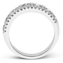 These stunning 18k white gold band contains .93 ctw of princess cut white diamonds as well as .44 ctw of round white diamonds.
