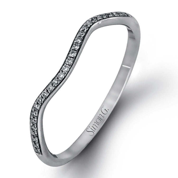 This dramatic white gold engagement ring and wedding band set are highlighted by .23 ctw of dazzling round cut white diamonds in a distinctive modern twist design.