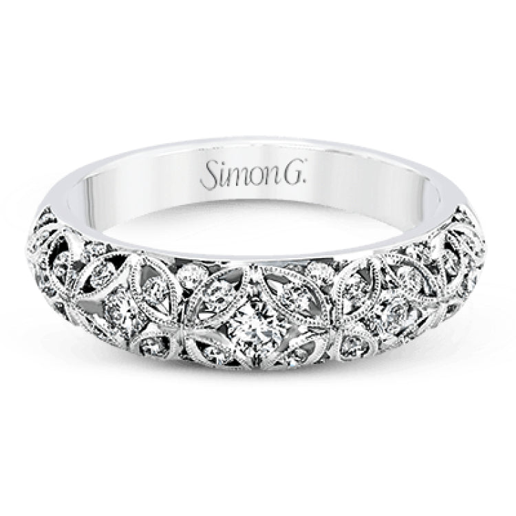This lacy vintage inspired white gold band features .62 ctw of round cut white diamonds in a charming floral design.
