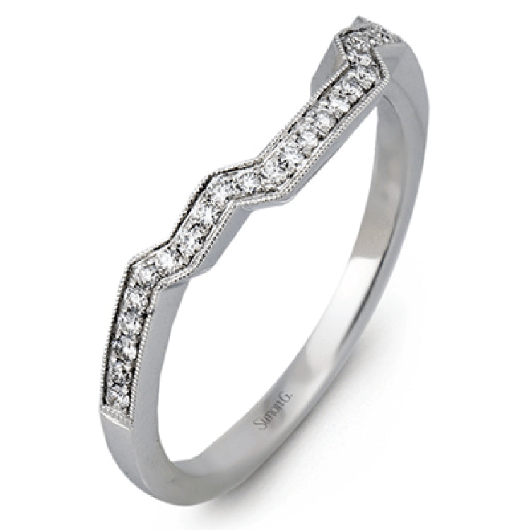 This brilliant white and rose gold contemporary ring is accentuated by a 2.0 ctw center mosaic of white diamonds, complemented by .30 ctw round cut white diamonds, .77 ctw emerald cut white diamonds, and .18 ctw round pink diamond accents.