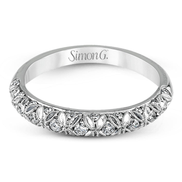 This intricate band has a floral, nature-inspired design and contains .32 ctw of white diamonds.