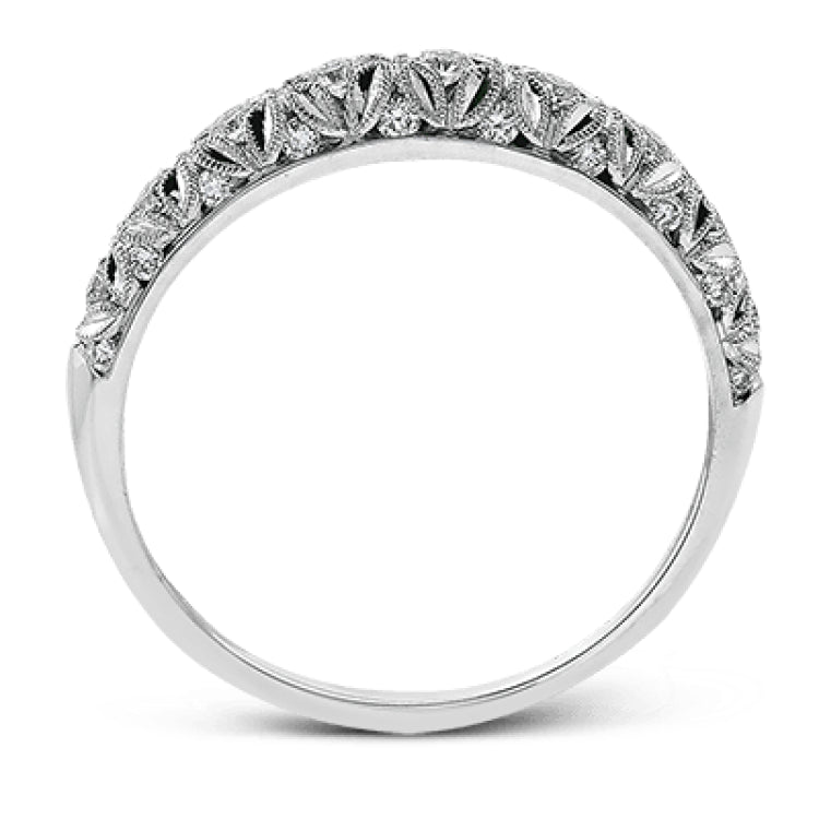 This intricate band has a floral, nature-inspired design and contains .32 ctw of white diamonds.