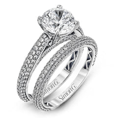 This classically styled white gold engagement ring is set with 1.30 ctw of shimmering white diamonds in a stunning design.