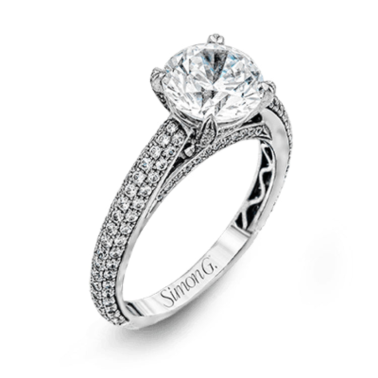 This classically styled white gold engagement ring is set with 1.30 ctw of shimmering white diamonds in a stunning design.