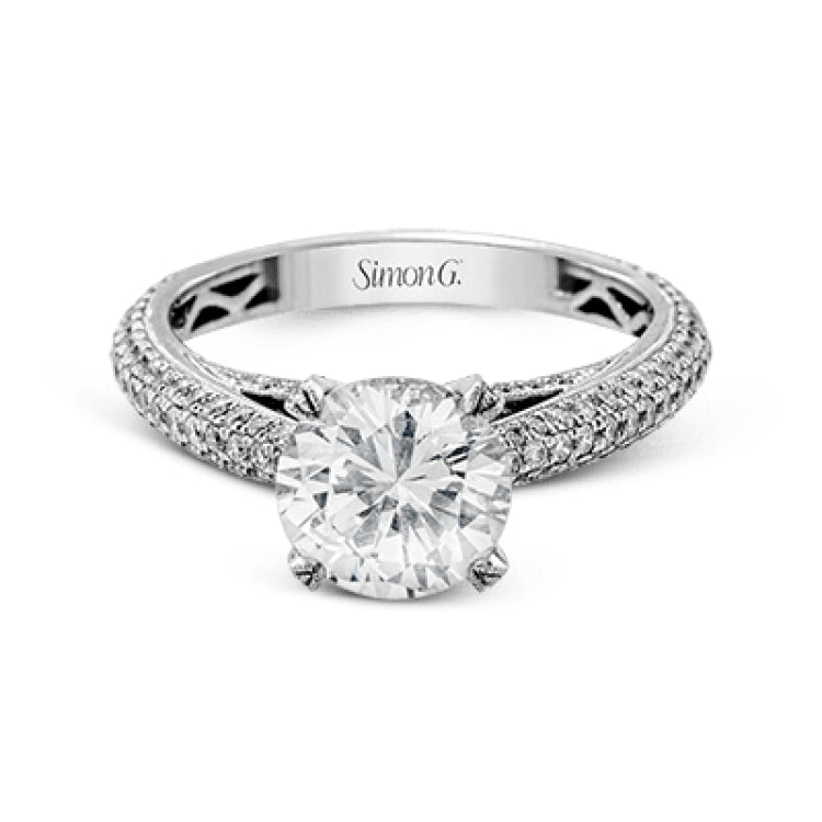 This classically styled white gold engagement ring is set with 1.30 ctw of shimmering white diamonds in a stunning design.