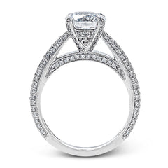 This classically styled white gold engagement ring is set with 1.30 ctw of shimmering white diamonds in a stunning design.