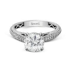 This classically styled white gold engagement ring is set with 1.30 ctw of shimmering white diamonds in a stunning design.