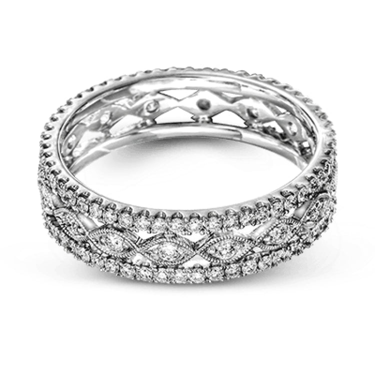 This wonderful 18k gold band features .87 ctw of white diamonds set into an intricate, three layer design.  It can be worn on its own as a fashion statement or function as a wedding band.