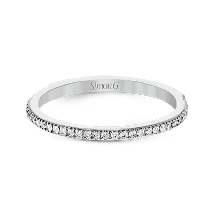 The classic, streamlined design of this 18k white gold wedding set is accented by .30 ctw of sparkling white round brilliant diamonds.