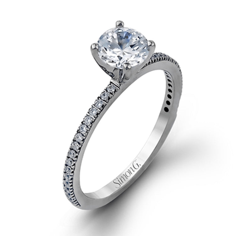 The classic, streamlined design of this 18k white gold wedding set is accented by .30 ctw of sparkling white round brilliant diamonds.