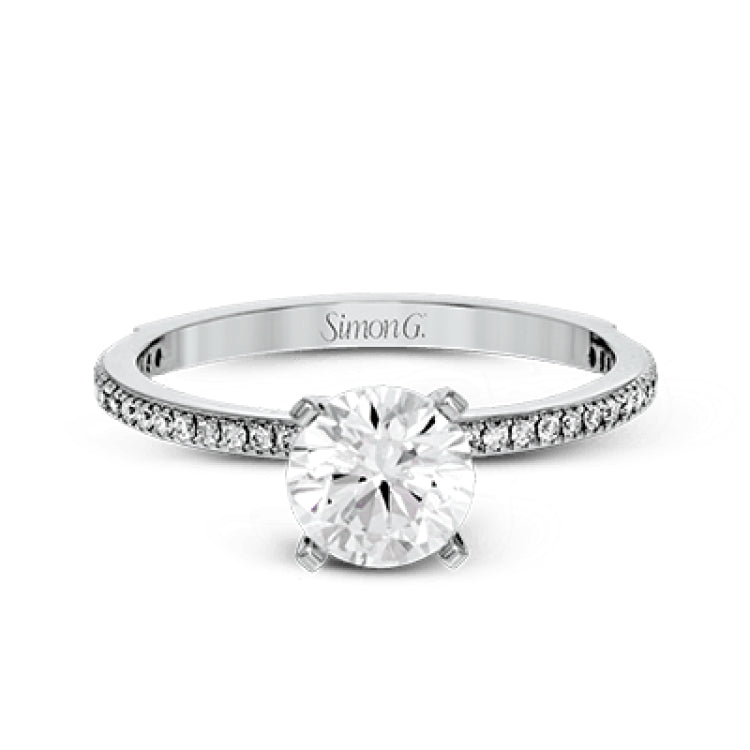 The classic, streamlined design of this 18k white gold wedding set is accented by .30 ctw of sparkling white round brilliant diamonds.