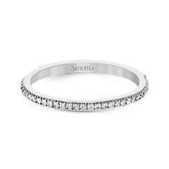 The classic, streamlined design of this 18k white gold wedding set is accented by .30 ctw of sparkling white round brilliant diamonds.