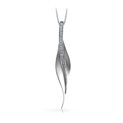 A sleek, svelte style highlights this modern leaf-like pendant, set with a column of .13 ctw of dazzling white diamonds.