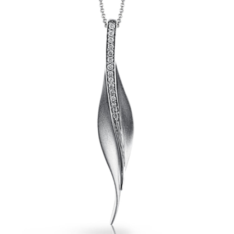 A sleek, svelte style highlights this modern leaf-like pendant, set with a column of .13 ctw of dazzling white diamonds.