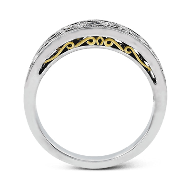Featuring a delicate, intricate vintage style, this white gold wedding band is set with .09 ctw of shimmering white diamonds.