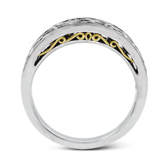 Featuring a delicate, intricate vintage style, this white gold wedding band is set with .09 ctw of shimmering white diamonds.