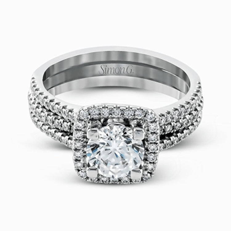 Featuring an eye-catching modern design, this white gold ring is accentuated with a dazzling .50 ctw round cut white diamonds.