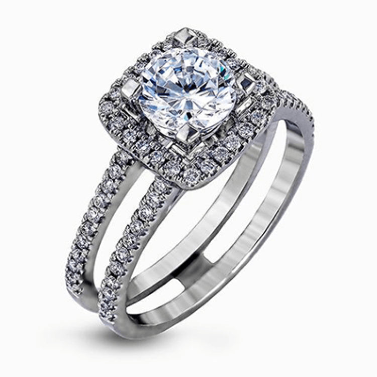 Featuring an eye-catching modern design, this white gold ring is accentuated with a dazzling .50 ctw round cut white diamonds.