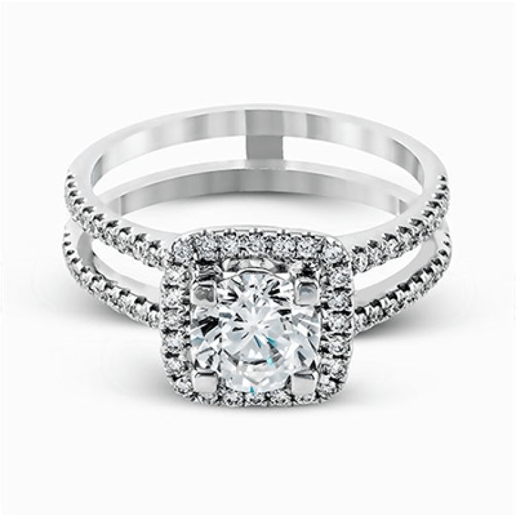 Featuring an eye-catching modern design, this white gold ring is accentuated with a dazzling .50 ctw round cut white diamonds.