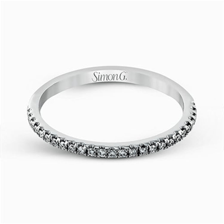 Featuring an eye-catching modern design, this white gold ring is accentuated with a dazzling .50 ctw round cut white diamonds.