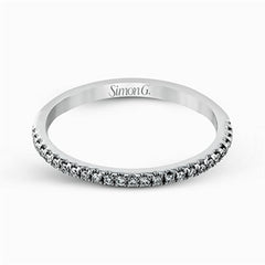 Featuring an eye-catching modern design, this white gold ring is accentuated with a dazzling .50 ctw round cut white diamonds.