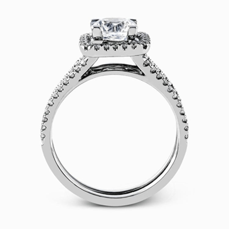Featuring an eye-catching modern design, this white gold ring is accentuated with a dazzling .50 ctw round cut white diamonds.