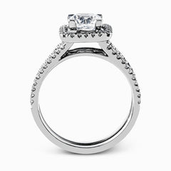 Featuring an eye-catching modern design, this white gold ring is accentuated with a dazzling .50 ctw round cut white diamonds.