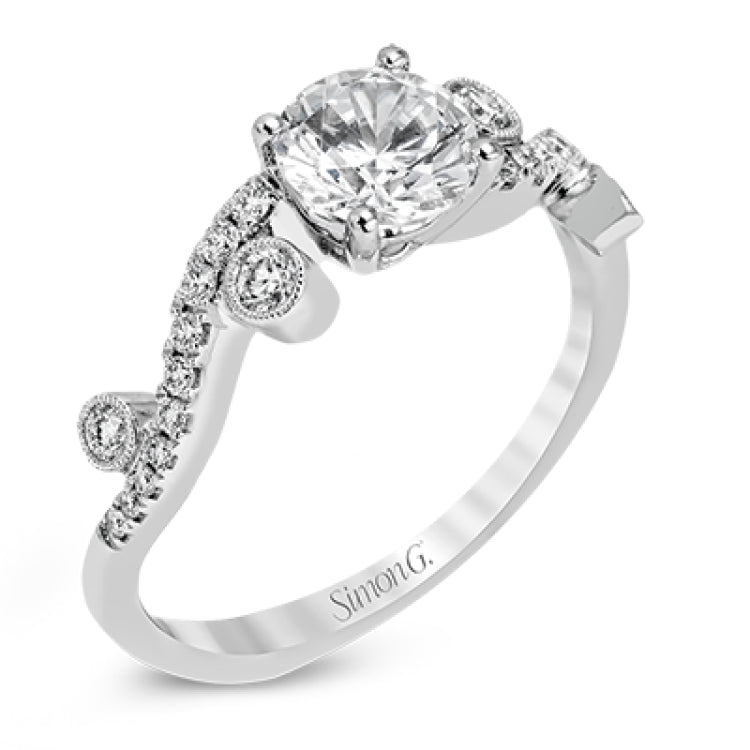 Playful and modern, this white gold wedding set sparkles with .31 ctw of round white diamonds highlighting the center stone.