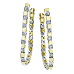 These versatile earrings can be worn in two ways, transforming from a line of diamonds into soft hoops. They're perfect for going from day to night.