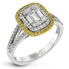 The modern style of this white gold ring is complemented by .44 ctw of glistening baguette cut white diamonds and .36 ctw of round cut white diamonds.