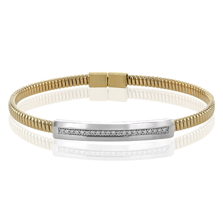 A perfect stacking bangle made of 18K yellow gold cable, adorned with a diamond plaque 0.23 ctw. and magnetic closure