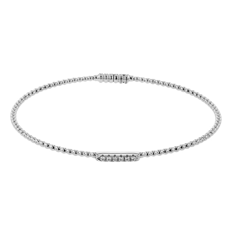 18K white gold beaded stackable bangle accented with 0.08 ctw of white diamonds, and a magnetic closure