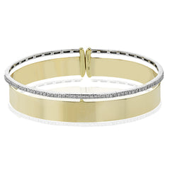 Make a statement with this wide bangle in yellow gold with a brushed finish and accented by a row of white diamonds .40 ctw.