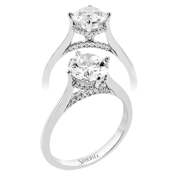 This elegant white gold engagement ring takes an oval center and is adorned with a delicate under halo, and a line of diamonds on the side profile 0.13 ctw