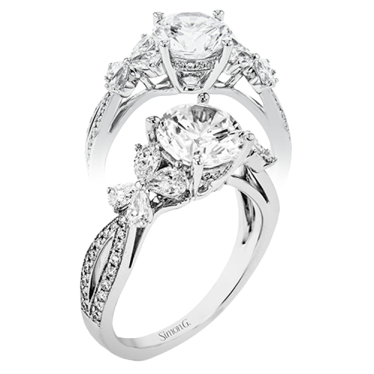 A beautiful engagement ring perfect for those who love floral inspired designs. It features a split shank setting with diamond accents .20ctw., & 8 pear shaped diamonds .62ctw. that create the look of petals around the center stone.