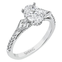 This modern 3 stone engagement ring is made for an oval center and flanked by 2 kite set diamonds 0.23 ctw, with round prong set diamonds along the shank 0.22 ctw.