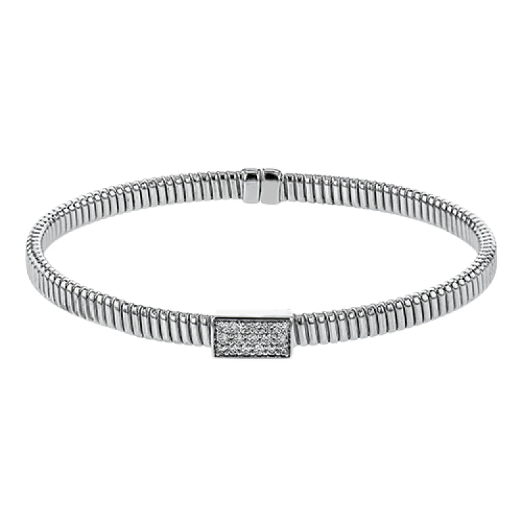 18k White gold textured bangle is highlighted by .25 ctw of diamonds set in a rectangular design. Perfect for stacking