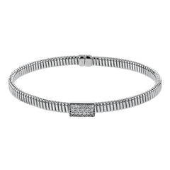 18k White gold textured bangle is highlighted by .25 ctw of diamonds set in a rectangular design. Perfect for stacking