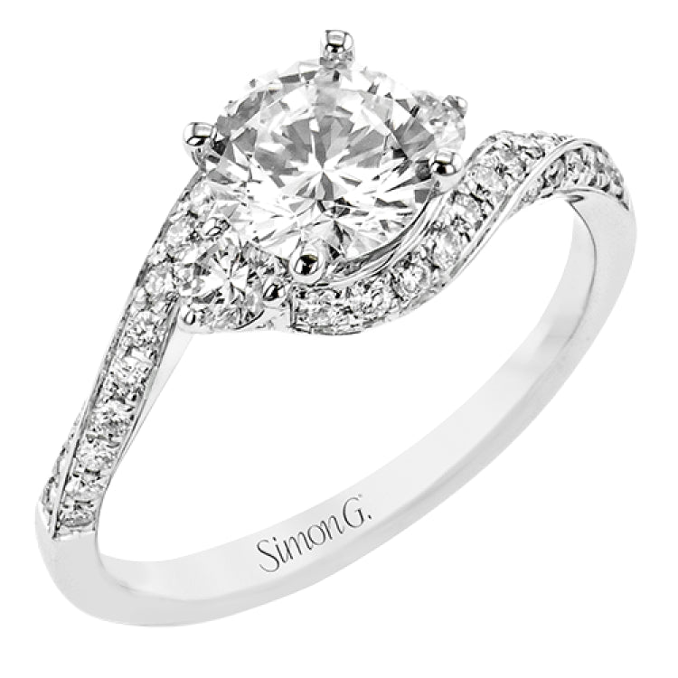 Contemporary 18 kt white gold engagement ring has a subtle knife edge and 2 diamonds of .21 ctw flanking the center, accented with a swirl of round diamonds .27 ctw