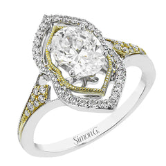A unique art deco style engagement ring in two-tone 18K gold accented by 0.21 ctw. of round diamonds