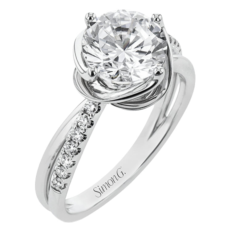 This criss-cross design engagement ring shimmers with 0.15 ctw round diamonds and a halo of gold strands wrapped around the center