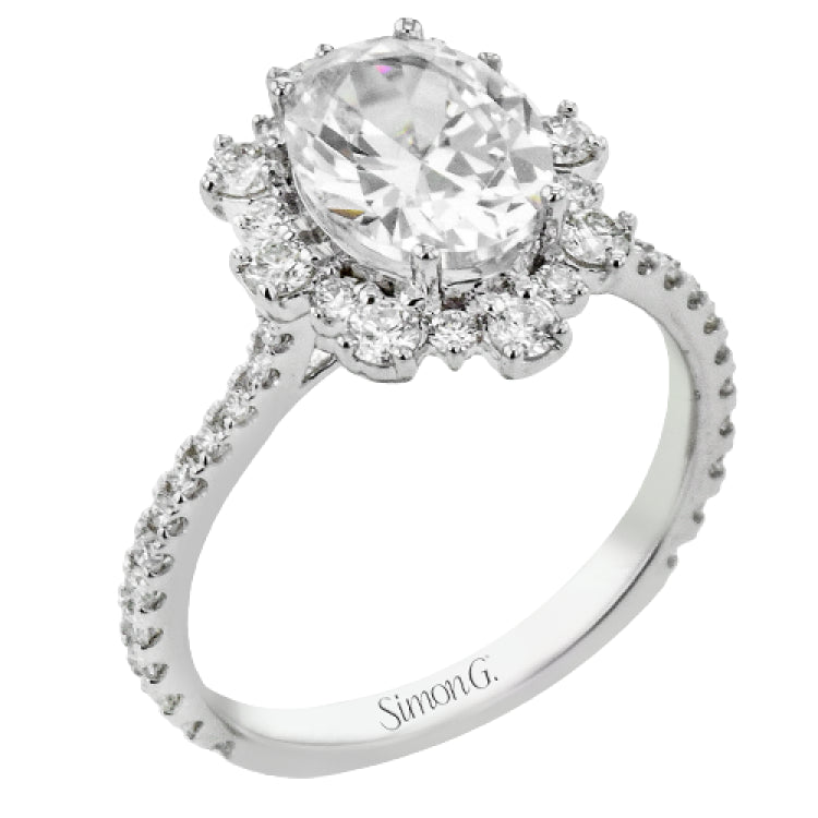 A geometric halo of diamonds in this Supernova Collection engagement ring replicates the effect of a thousand stars.